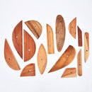 Wooden clay surface refining tool